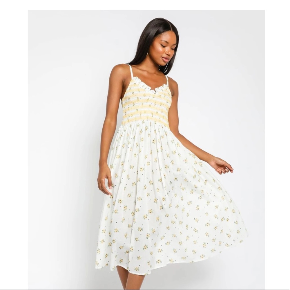 Yellow floral smocked midi dress